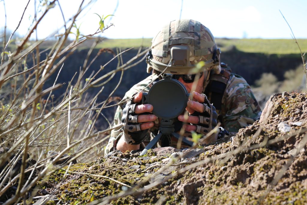 An operator positioning a Krakatoa charge